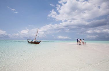 Zanzibar dhow boat rental sunset or snorkeling trip