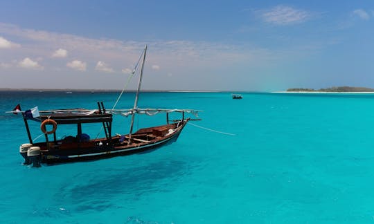 Zanzibar dhow boat rental sunset or snorkeling trip