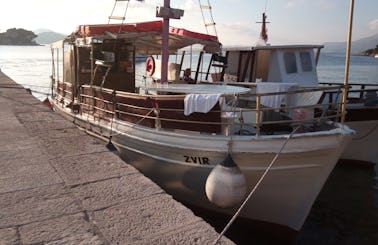 Traditional Wooden Boat for Private Tours in Dubronik with lunch on request and drinks unlimited