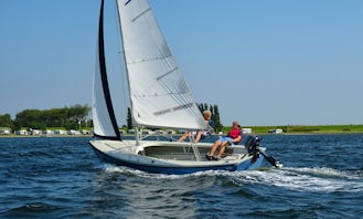 Sail the lake in Zeeland with this 22' Randmeer Sailboat