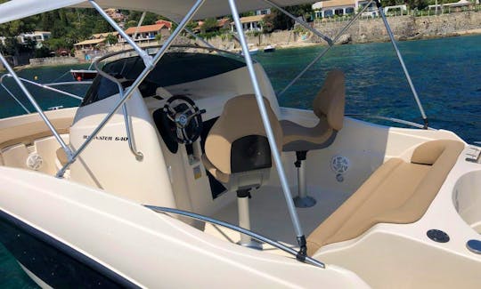 Explore Santorini with Blu Water 640 “Captain Marvel” Boat in Vlichada, Greece