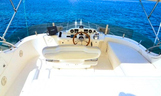 Take a voyage on Mykonos Island with Sealine 410s Flybridge Motor Yacht