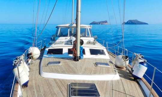 Sail cruising among the Dodecanese islands in Greece