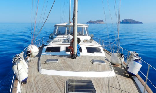 Sail cruising among the Dodecanese islands in Greece