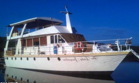 Get away from it all and enjoy the comfort of the Lady Jacqueline houseboat.