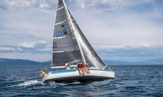 Sit on the windward side of the boat like a professional race crew.