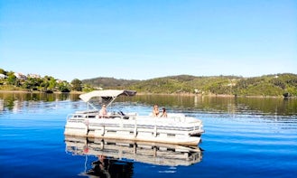 Sun Tracker Party Barge! Pontoon boat for cruises at Castelo de Bode, Portugal