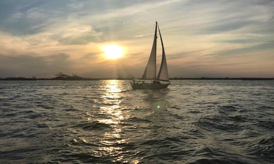 Sail New York's historic waterways aboard Water Music, a classic, semi-custom 40 foot Passport yacht.