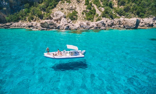 Book the Maxi Cruise! All Day Boat Tour to Cala Luna onboard  a Skippered 12 People Semi Regid Inflatable Boat