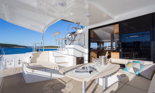 Lagoon 42 Cruising Catamaran Charter for 12 People from Furnari, Sicilia