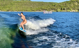 Surf and Wakeboard on Lake Travis! We Have a Fleet of Boats!