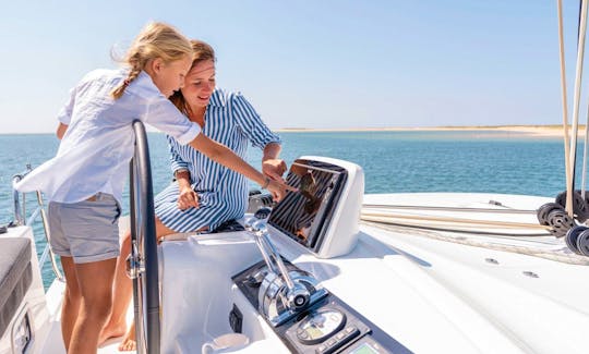 Explore Cyclades on this Lagoon 46 Bareboat Charter for Up to 12 Guests