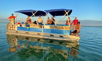 Amazing Fisher 24' Pontoon Boat to rent in Lower Florida Keys. Multi day, weekly, or monthly rental. We deliver!