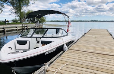 Enjoy the outdoors on a Tahoe 450 Bowrider with a Captain