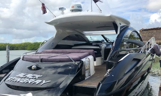 Luxury black Sunseeker 64 Yacht for Charter in Cancún, Mexico