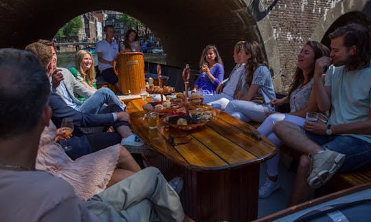 10-12 persons: 'Curacao Canal Boat' in Amsterdam, Netherlands (100% electric)