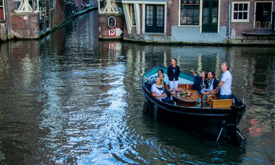10-12 persons: 'Curacao Canal Boat' in Amsterdam, Netherlands (100% electric)