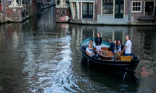 10-12 persons: 'Curacao Canal Boat' in Amsterdam, Netherlands (100% electric)