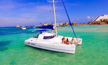 Cheers to the Seas: 37ft Catamaran Charter in Cancún with Open Bar Options!