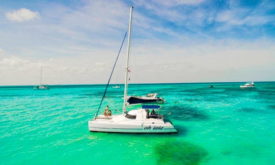 Cheers to the Seas: 37ft Catamaran Charter in Cancún with Open Bar Options!