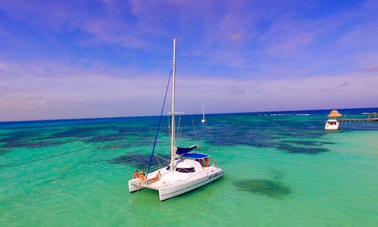 Cheers to the Seas: 37ft Catamaran Charter in Cancún with Open Bar Options!