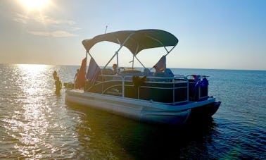 Barco flutuante Bennington de 19 pés para alugar na Ilha South Padre!