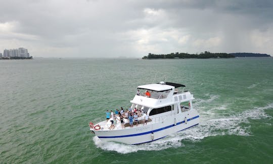 Yacht de croisière flybridge de 57 pieds construit sur mesure à louer avec skipper à Singapour