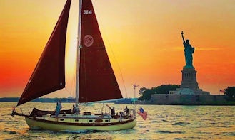 Sail NYC's skyline aboard the Genesis, a beautiful classic sailboat!