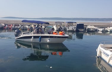 Rent a Calipso 20 Powerboat for 8 people in Kaštela