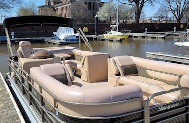 Sanpan 2500 RE Pontoon in Washington, comfort on the water.  No additional fees for the captain, no additional fees for gas.