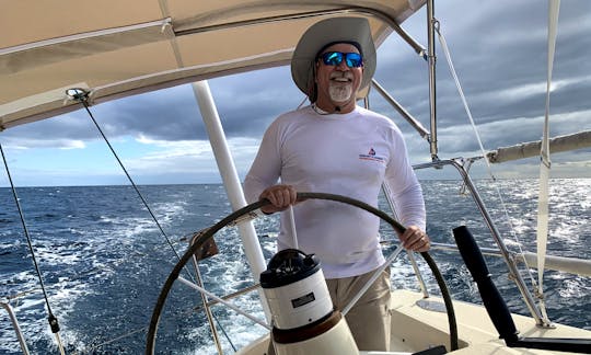 Your captain has thousands of miles of sailing experience. He is happy to teach you and let you take the wheel!