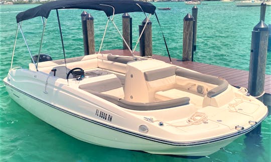 This boat seats up to 12 thanks to L-shaped "pontoon-style" cockpit seating and a spacious bow. A roomy in-floor locker accommodates for extra storage