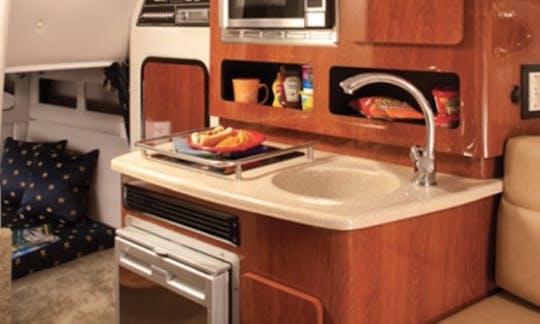 Stove, microwave, sink, and refrigerator! Snacks water! A bottle of sparkling wine available for guest 21+.