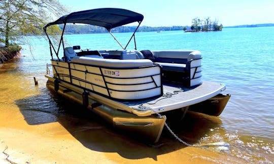 22' Tritoon w/ Bimini Shade Top & Tow Bar for up to 12 guests. Cuts through wake like butter!