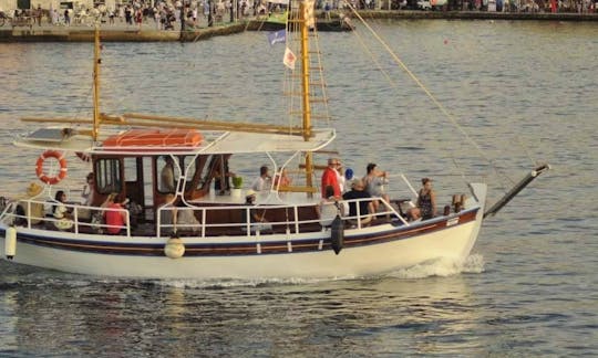 Ferryman boat - the one and only traditional wooden boat that operates cruises in the Old Venetian Port of Chania.