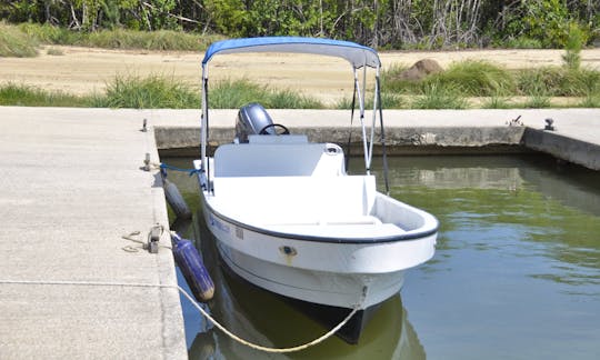 23 ft 70 HP power boat with comfortable seating.