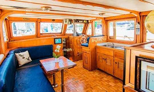 The galley is all teak. We also have a bathroom inside the cabin.