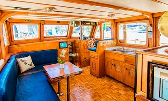 The galley is all teak. We also have a bathroom inside the cabin.
