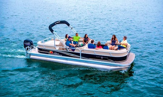 24 Foot Long Suntracker Party Barge with seating for 10