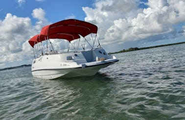 Chaparral 23ft Powerboat with Bimini Cover for Daily Rental in Grand Haven