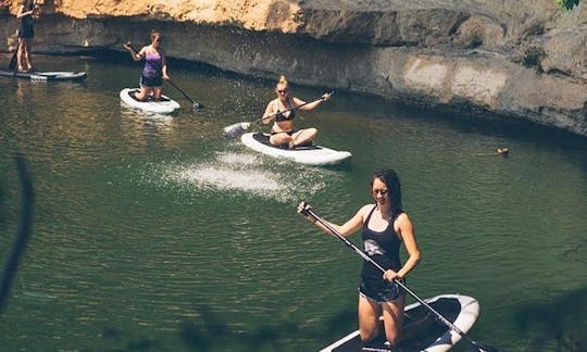 A group out on Lake Natoma follow the leader style.