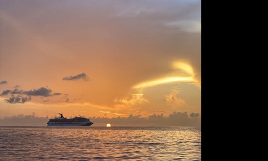 Beautiful sunrise as carnival cruise approaches the  Port of Nassau