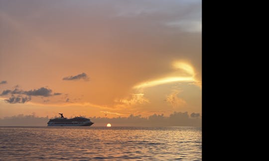 Beautiful sunrise as carnival cruise approaches the  Port of Nassau