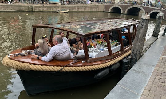 Private boat hire in Amsterdam with captain & bar!