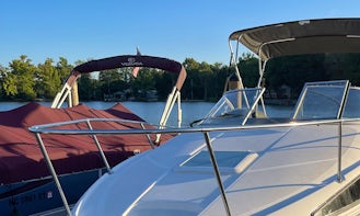 27 Foot Cabin Cruiser with Towable Raft on Lake Wylie
