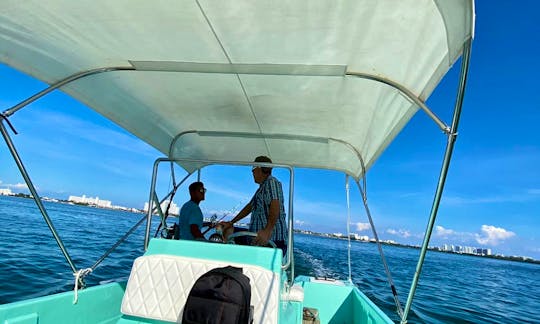 Private Fun Boat experience Cancun lake & Bay and sightseeing smooth ride enjoy the Cancun Bay see the Cancun Mangroves, experience lake fishing on the ride optional