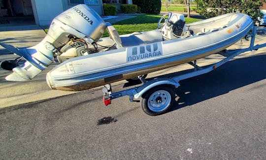 Boat has a trailer and can be towed to any local lake