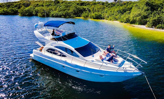 42' Azimut Motor Yacht anchored at a sandbar in Jupiter, Florida