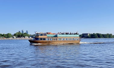 Enjoy the best part of Helsinki by sea with this vintage 50ft Mahogany Boat