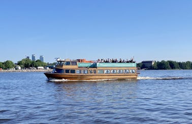 Enjoy the best part of Helsinki by sea with this vintage 50ft Mahogany Boat